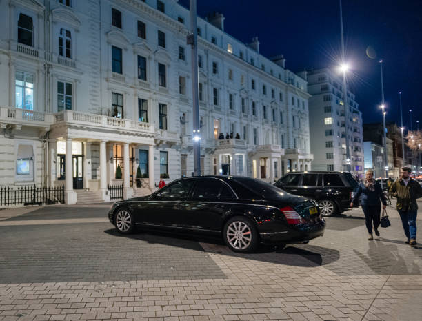 Luxury airport transfer car waiting outside Heathrow Airport in London.